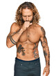 Handsome man with beard and long hair standing shirtless showing tattoos feeling unwell and coughing as symptom for cold or bronchitis. health care concept.