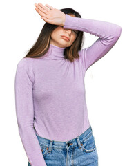 Sticker - Young beautiful teen girl wearing turtleneck sweater covering eyes with arm, looking serious and sad. sightless, hiding and rejection concept