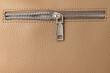 Leather bag and zipper as texture background