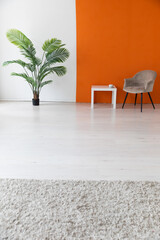 Poster - Office chair and green plant in white orange room interior