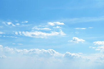 Wall Mural - Blue sky with white cloud. The summer heaven is colorful clearing day Good weather and beautiful nature in the morning.