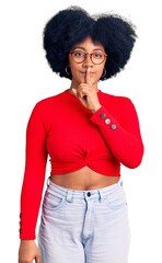 Poster - Young african american girl wearing casual clothes and glasses asking to be quiet with finger on lips. silence and secret concept.