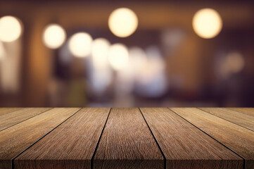 Wooden table or surface with blurred interior background