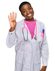 Canvas Print - Young african american woman wearing doctor uniform and stethoscope showing and pointing up with fingers number four while smiling confident and happy.