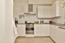 Small Kitchen With White Cabinets And Appliances