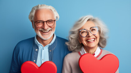 Sticker - Happy couple holding red hearts celebrating valentine's day