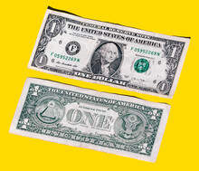 Closeup Of One Dollar Paper Currency Isolated On Yellow Background With Copy Space