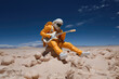© ADDICTIVE STOCK - Futuristic man playing the guitar in a desert. Generative AI