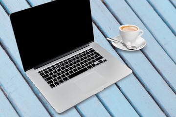 Canvas Print - Laptop computer with blank screen on office desk