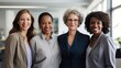 © Barsimur - Womens Day. Labor Day. Interracial group of powerful independent executive women in the office Generative AI
