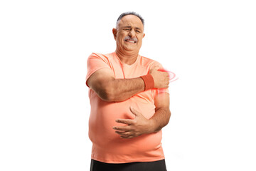 Canvas Print - Mature man in sportswear holding red inflamed shoulder