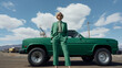 © Soccer mom - Portrait of a young woman in a emerald green men's business suit standing in front of green truck on a construction site.