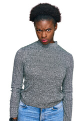 Poster - Young african american girl wearing casual clothes skeptic and nervous, frowning upset because of problem. negative person.