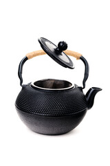 Wall Mural - Traditional black asian cast iron kettle with open lid isolated on white background