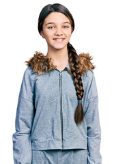 Canvas Print - Young brunette girl with long hair wearing casual sweatshirt looking positive and happy standing and smiling with a confident smile showing teeth