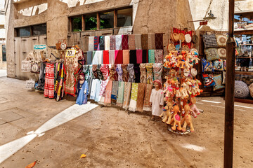 Wall Mural - Shop with souvenirs for tourists in the reconstructed old part of the Dubai city - Al-Bastakiya quarter in the Dubai city, United Arab Emirates