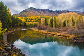 Peaceful Autumn Reflections In Glacier National Park