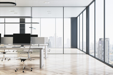 Poster - Contemporary glass coworking office interior with wooden flooring, panoramic windows and city view, furniture, equipment and computer monitors. 3D Rendering.