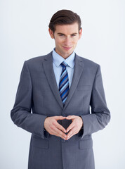 Wall Mural - Portrait, smile and a young business man in studio on a white background for planning or brainstorming. Corporate, professional and suit with a happy employee looking confident as a mastermind