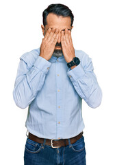 Wall Mural - Middle aged man with beard wearing business shirt rubbing eyes for fatigue and headache, sleepy and tired expression. vision problem