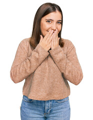 Canvas Print - Young beautiful woman wearing casual clothes laughing and embarrassed giggle covering mouth with hands, gossip and scandal concept