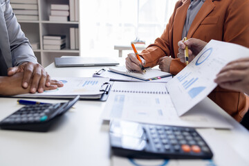 Sticker - Close up Team of colleagues discussing business Accounting using calculating income-expenditure and calculator analyzing real estate investment data report Financial and tax systems concept.