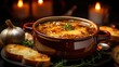 Classic french onion soup with grating cheese and parsley. Served with toasted baguette on the wooden table background. Serving fancy vegetarian food in a restaurant.