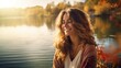 A smiling woman enjoying a peaceful lakeside colorfull background, with warm hues reflecting in her eyes