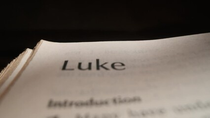 Wall Mural - Open Bible chapter Luke title slide over page