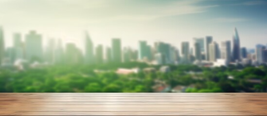 Poster - Morning city background with blurred window glass garden green and wood table top for product display montage Copy space image Place for adding text or design