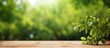 Nature themed background with a wooden table in a garden featuring bokeh in a spring summer setting The wood surface is versatile serving as a shelf counter desk and for picnic meals and produc