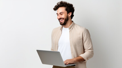 Poster - Man with brown hair, wearing a beige jacket holding a laptop, against grey background.