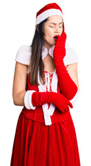 Sticker - Young beautiful caucasian woman wearing santa claus costume bored yawning tired covering mouth with hand. restless and sleepiness.