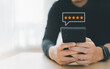 © Kamolapooh - Satisfaction survey concept. Customer services best excellent business rating experience. user give rating to service experience on online application.