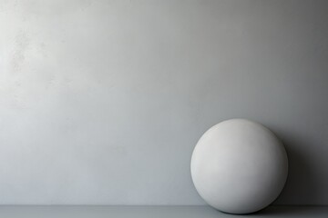 Poster - A white egg sitting on top of a table. This versatile image can be used in various contexts