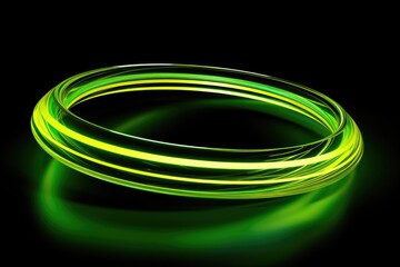 Poster - A close-up view of a green ring on a black background. This image can be used for various purposes