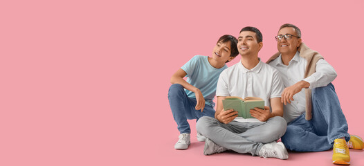 Sticker - Happy little boy, his dad and grandfather reading book on pink background with space for text