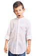 Cute blond kid wearing elegant shirt in shock face, looking skeptical and sarcastic, surprised with open mouth
