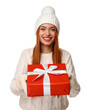 © New Africa - Young woman in hat and sweater with Christmas gift on white background