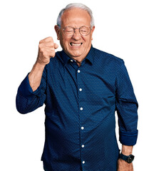 Poster - Senior man with grey hair wearing casual shirt and glasses angry and mad raising fist frustrated and furious while shouting with anger. rage and aggressive concept.