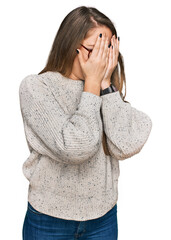 Canvas Print - Young blonde woman wearing casual sweater and glasses with sad expression covering face with hands while crying. depression concept.