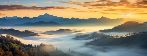 Wall Mural - sunrise over the foggy mountains,