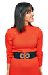 © Krakenimages.com - Young hispanic woman wearing casual clothes looking away to side with smile on face, natural expression. laughing confident.