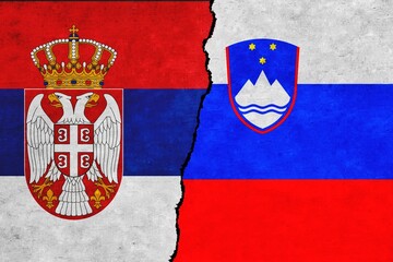 Serbia and Slovenia painted flags on a wall with a crack. Slovenia and Serbia relations. Serbia and Slovenia flags together