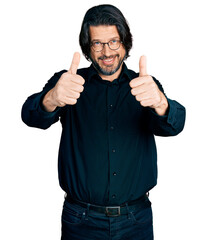 Poster - Middle age caucasian man wearing casual clothes and glasses approving doing positive gesture with hand, thumbs up smiling and happy for success. winner gesture.