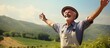 Joyful elderly man farmer stands on farmland, arms raised in happiness.