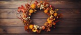 Fototapeta Las - Autumn wreath as decoration.