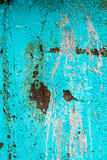 Fototapeta  - Turquoise paint on rusty metal