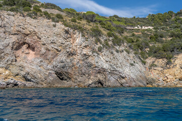 Wall Mural - cliffs at Cala del Gesso cove, Argentario, Italy