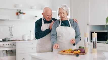 Sticker - Happy, senior couple and cooking in kitchen for meal prep, lunch and ingredients for dinner at home. Old man chat to elderly woman while cutting healthy vegetables, food and nutrition in retirement